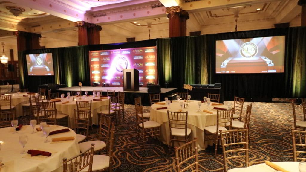 Large screens, pipe and drape, projection screen, lighting